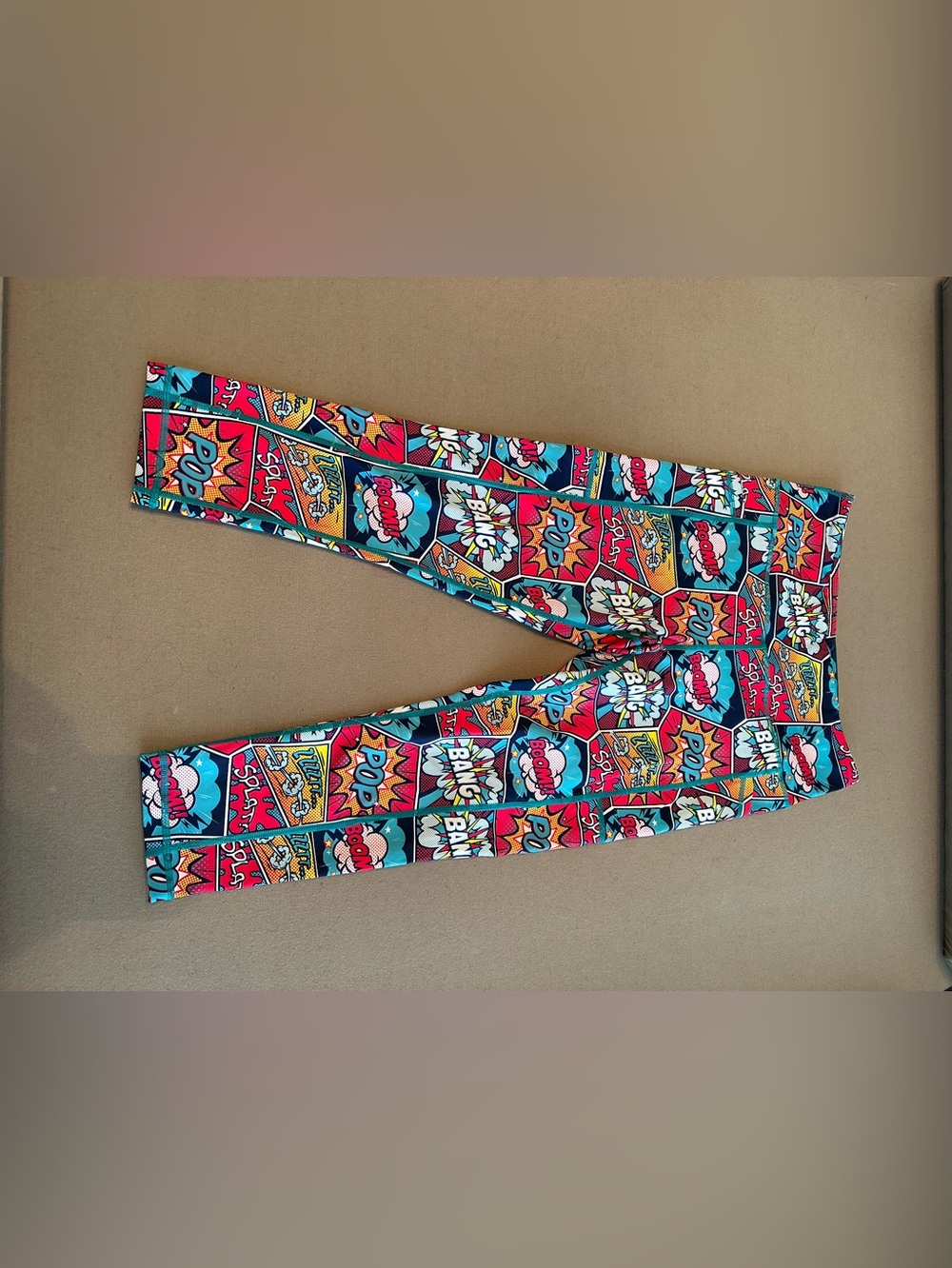 Women’s CVG Comic-Print Capri Leggings in Multi-Color